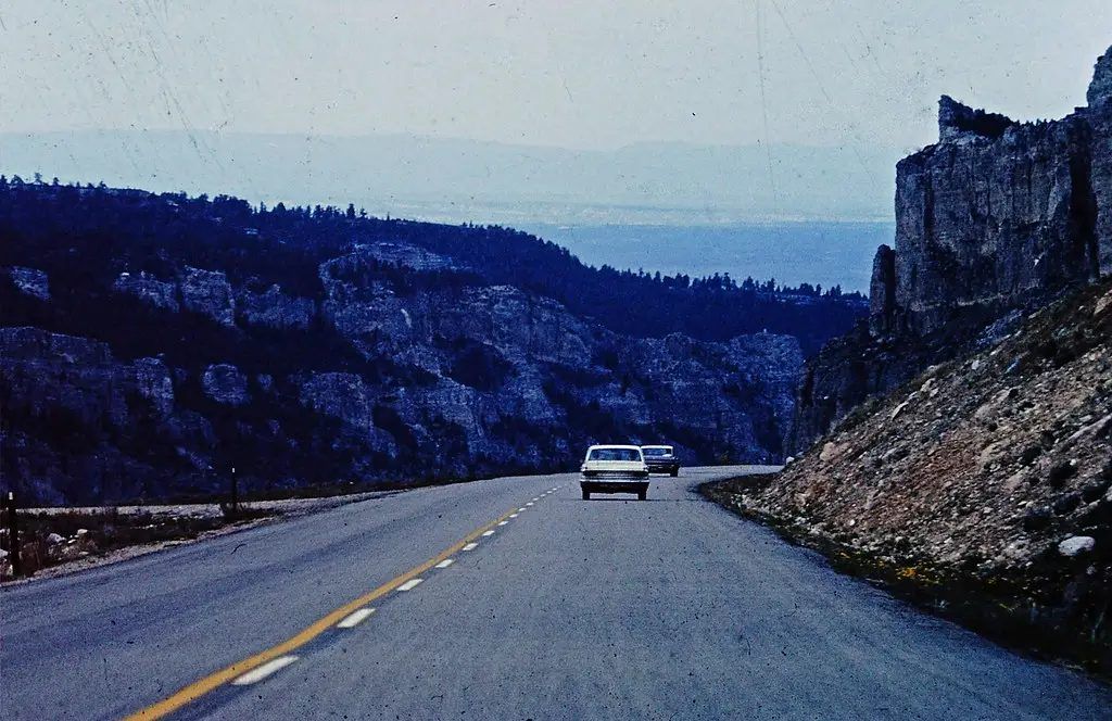 A Black Hills highway running between tall rock cliffs